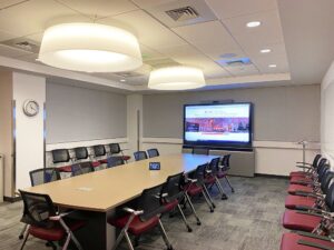 Two new conference rooms connect to the Education Center via NAV AVoIP, providing additional gathering spaces for collaboration. Photo courtesy of Heidi Grassley, ClarkPowell