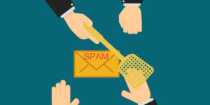The executive hands prevent the employee from receiving and opening a spam mail, the concept of information security in companies, data protection on the internet