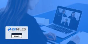 Zoom and 22Miles logos against a blue background superimposed on a person attending a video call.
