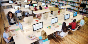 DaaS, Device as a service, Young students using computers in class